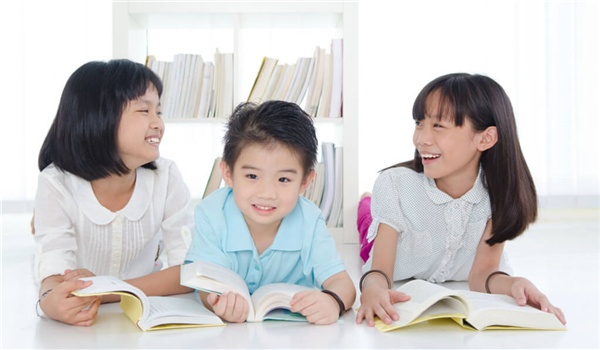 Three kids laughing 