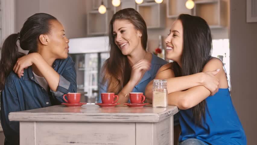 three female friends chatting 