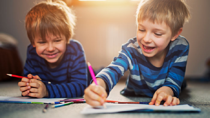 Two boys learning together