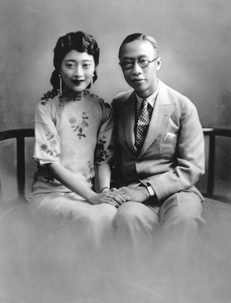 Puyi, the last empire of dynasty China, with his wife Wanrong wearing a qipao